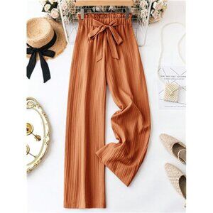 Plisse Trousers With Paper Bag Waist, Front Buttons, And Tie Detail For Women